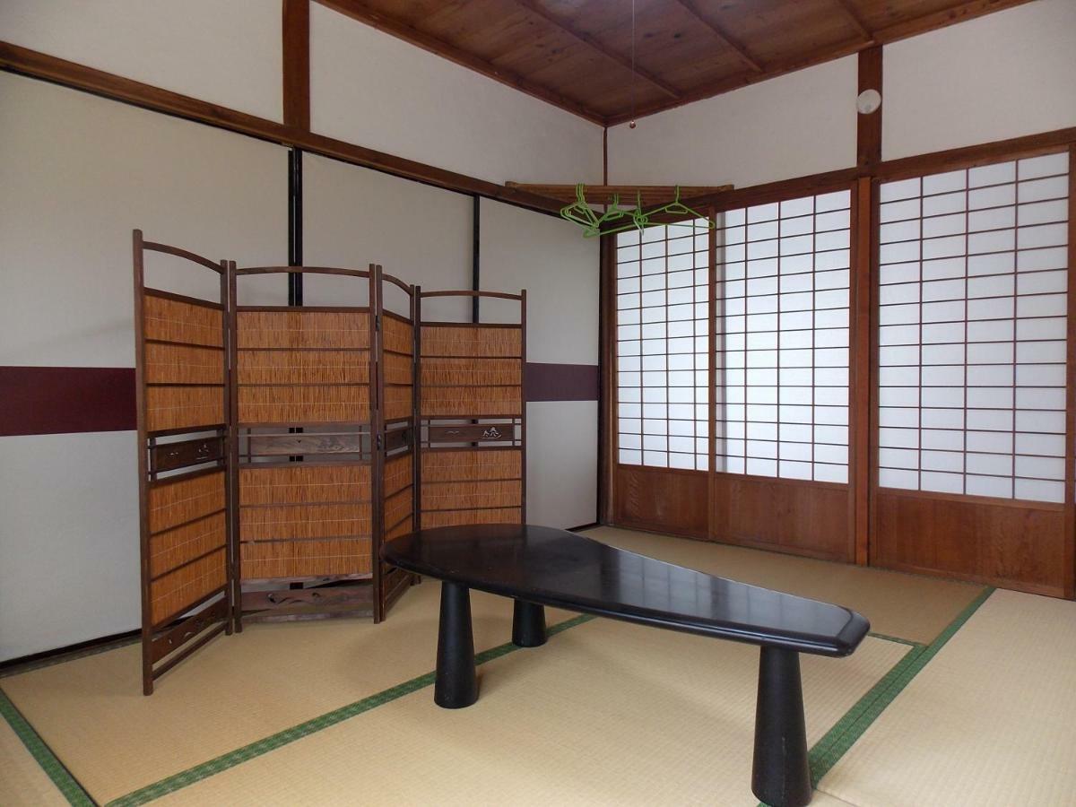Guesthouse Yawara โอคายาม่า ภายนอก รูปภาพ