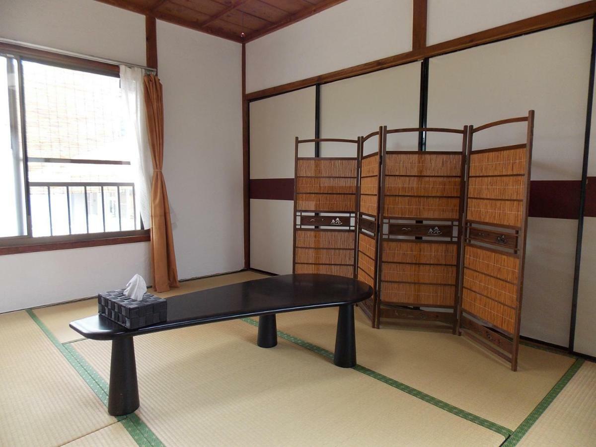 Guesthouse Yawara โอคายาม่า ภายนอก รูปภาพ