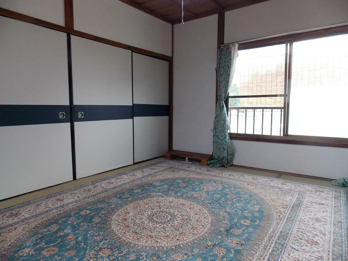 Guesthouse Yawara โอคายาม่า ภายนอก รูปภาพ