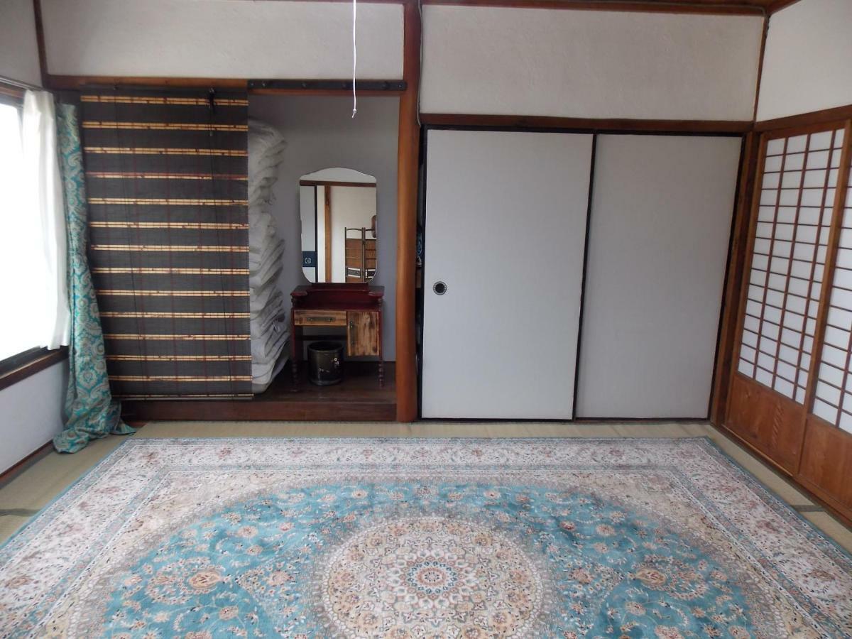 Guesthouse Yawara โอคายาม่า ภายนอก รูปภาพ